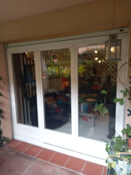 Pose en sur mesure porte fenêtre bois à Toulouse