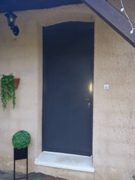 Dépose totale d'une porte ancienne à Saiguède