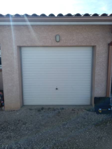 Remplacement d'une porte de garage par une Baie coulissante en Aluminium avec son volet roulant