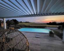 Installation d'une pergola bioclimatique MARQUISES STORES à Cadours